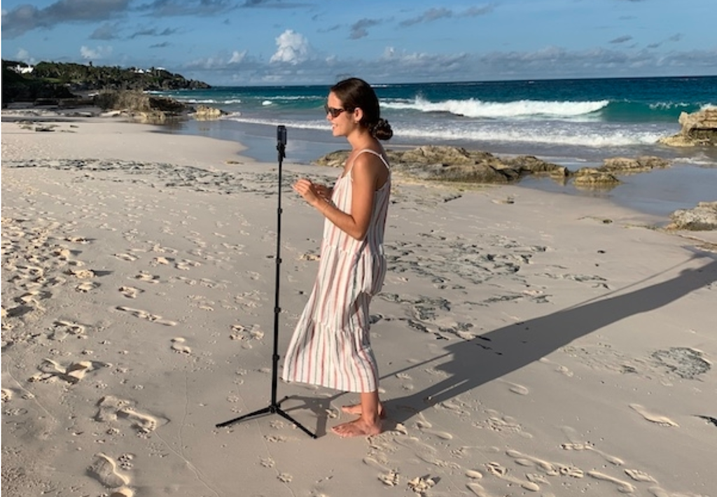 Camila Papadopoulo filming a scene on a beach